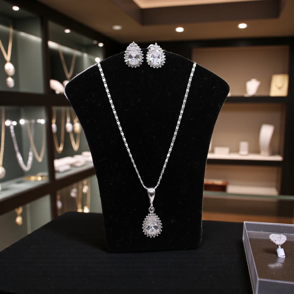 Aretes C/ Cadena Dije Gota Blanca en Plata .925