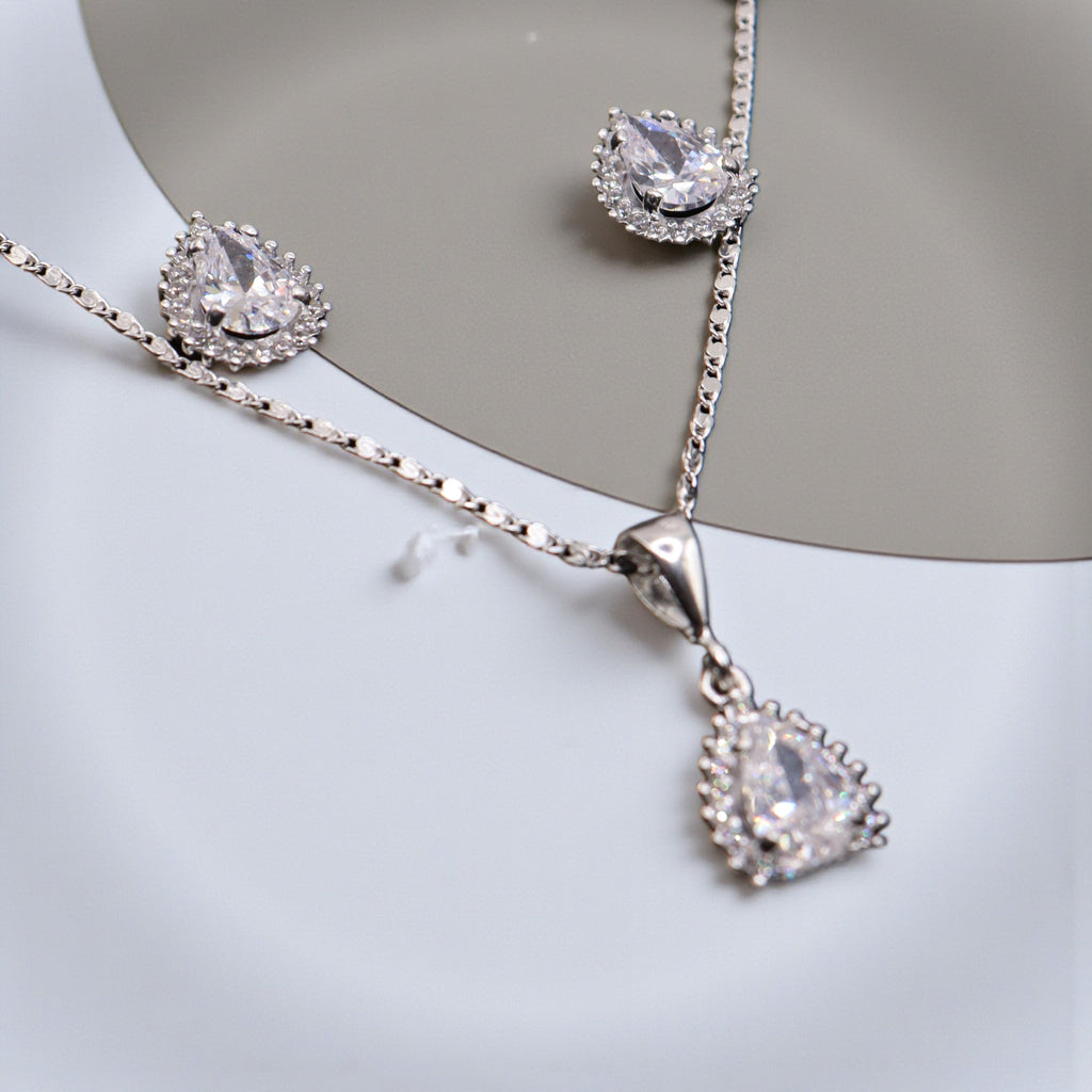 Aretes C/ Cadena Dije Gota Blanca en Plata .925