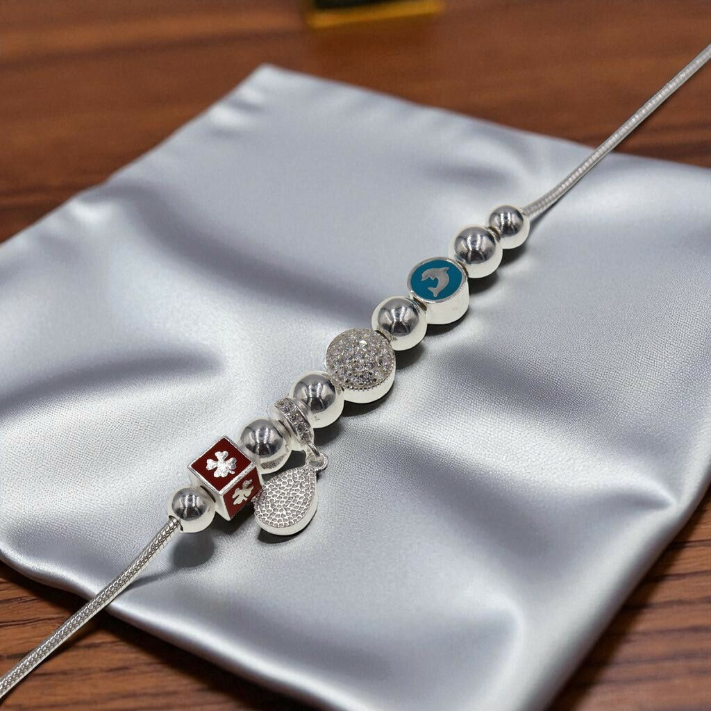 Pulso Con Dije De Trebol y Delfin De Plata .925 19 cm